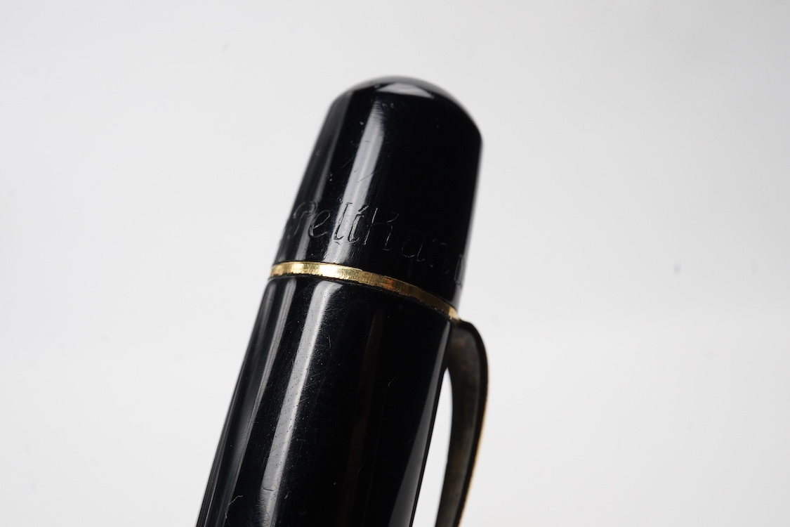 A Pelikan 100N fountain pen fitted with a 14ct. gold Pelikan nib